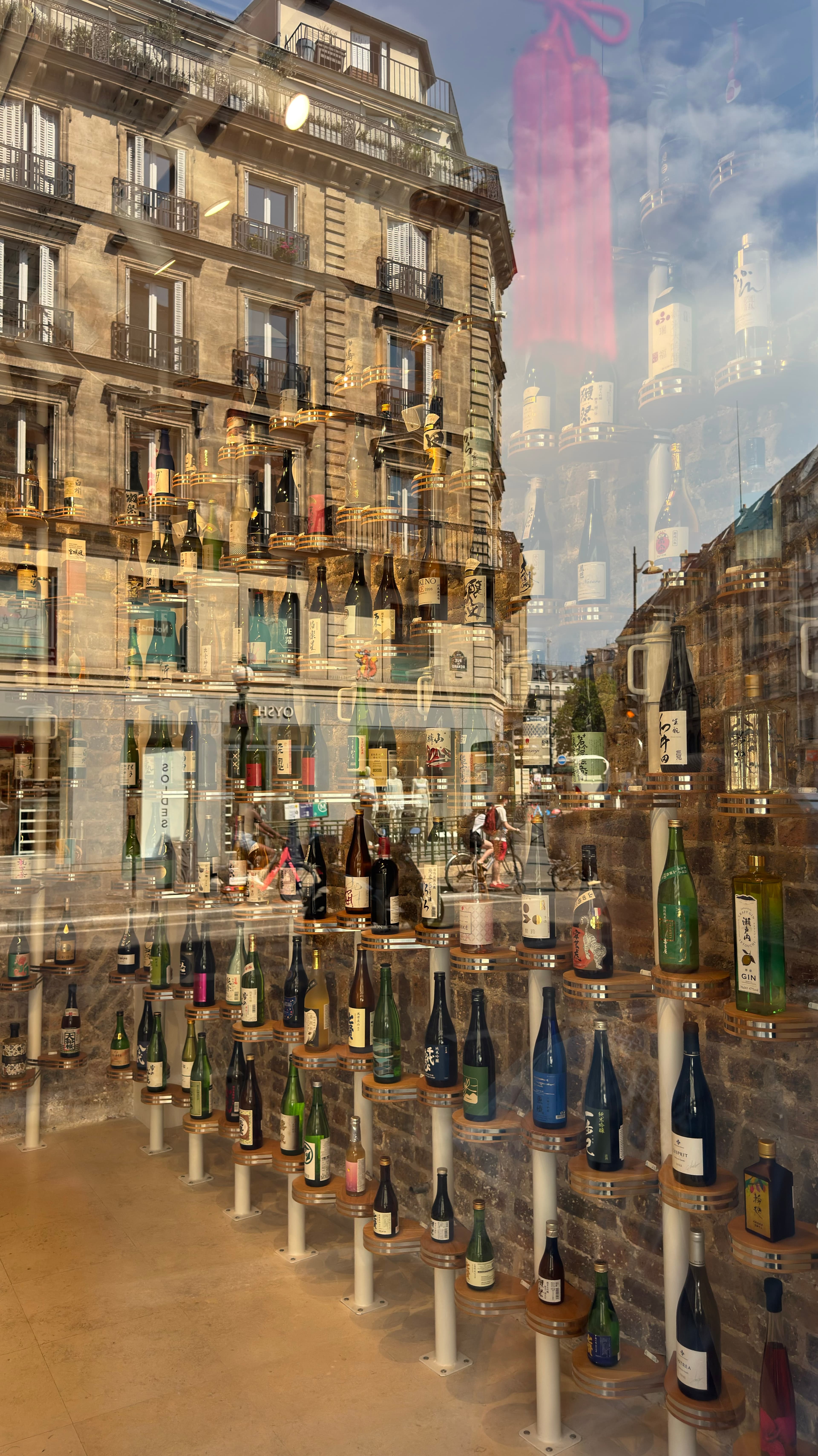 Picture of a Sake shop on our way to Saint-Louis Island. At first, I wanted to get into the shop for a better view of the display but decided against it when I saw the reflection effect.