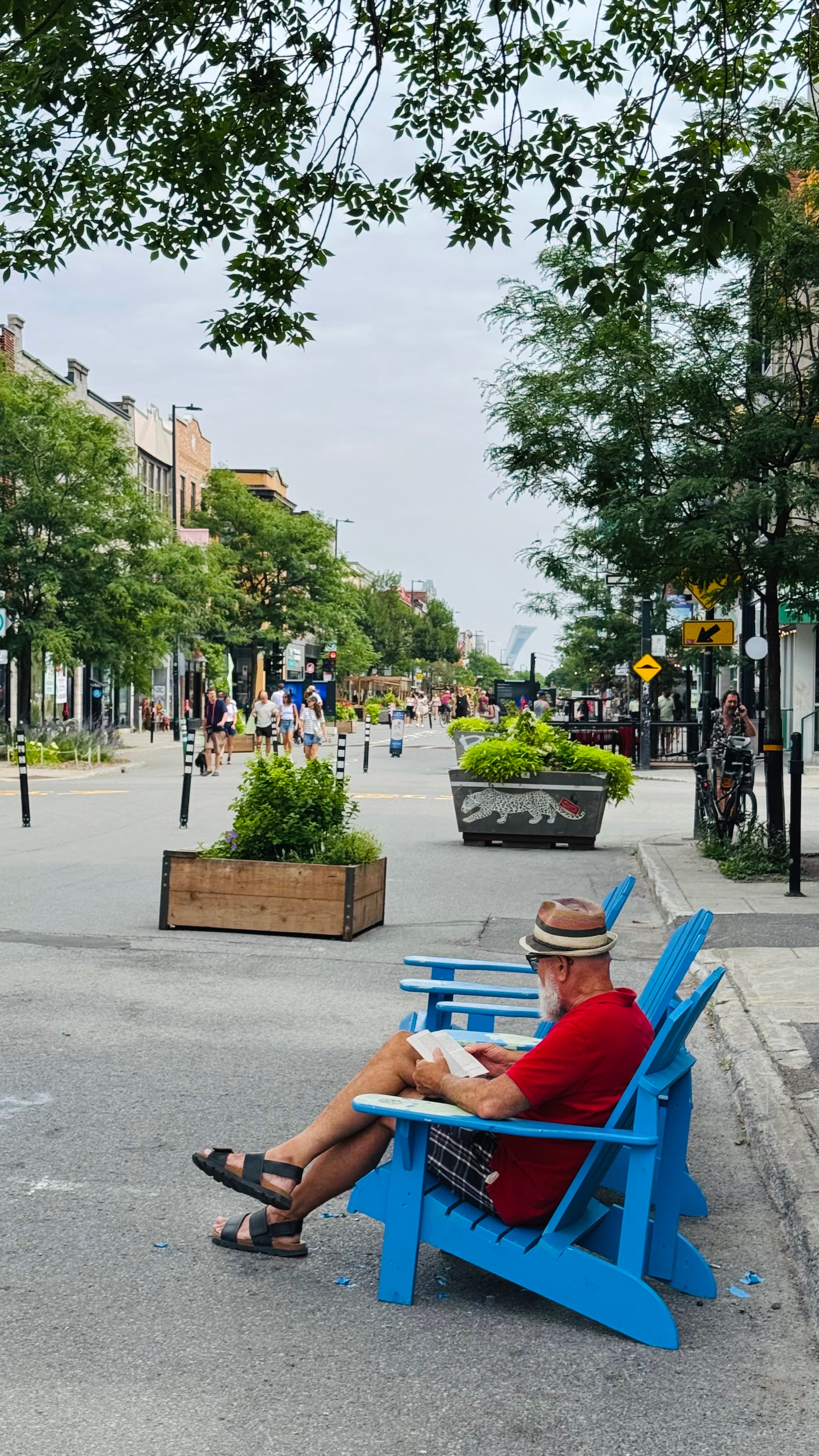 On Mont-Royal Street, in the morning. The street is closed for cars for a few days in the summer. People are enjoying and taking advantage of this.