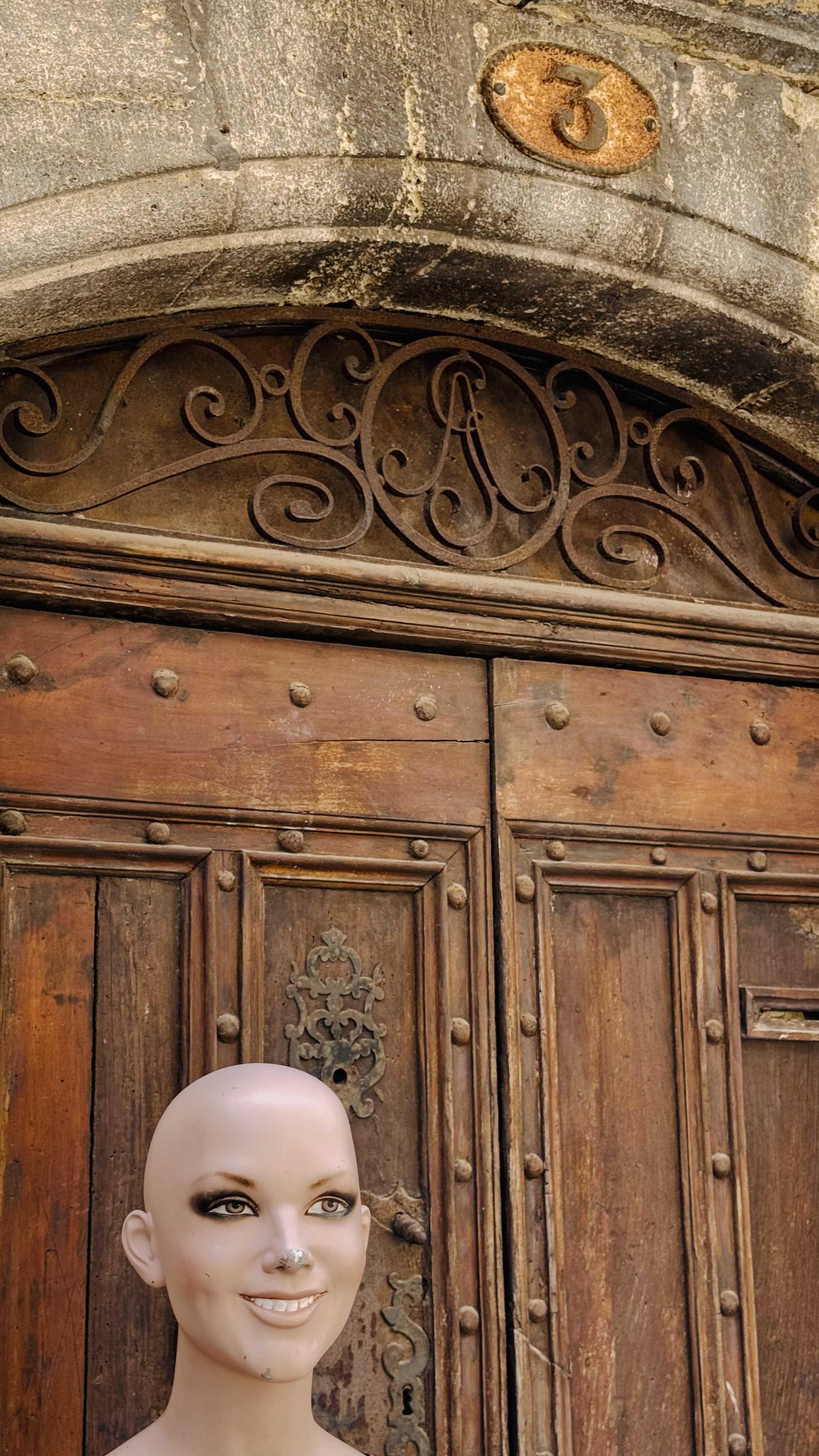 I like taking photos of old doors... and this is an example. Except this one has a little twist.