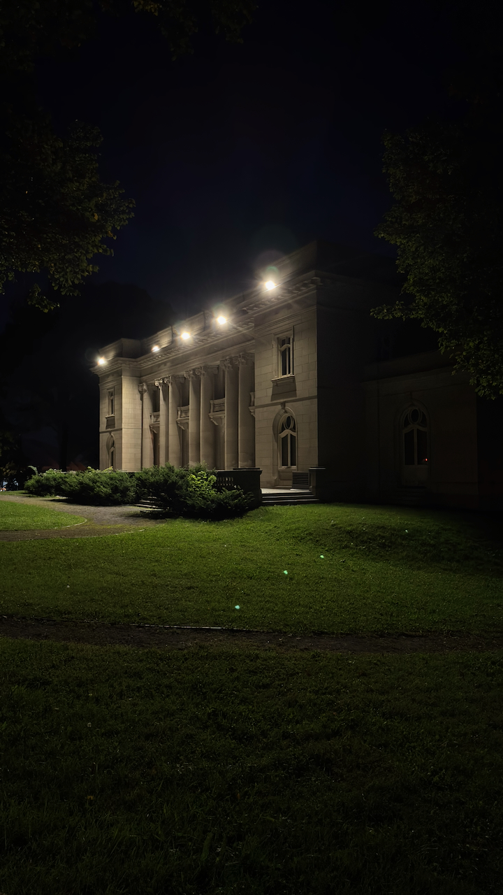 It's an old building on Sherbrooke Street E, near the Olympic Stadium. I often pass it during the day while biking on Rachel Street, but at night it feels different.
